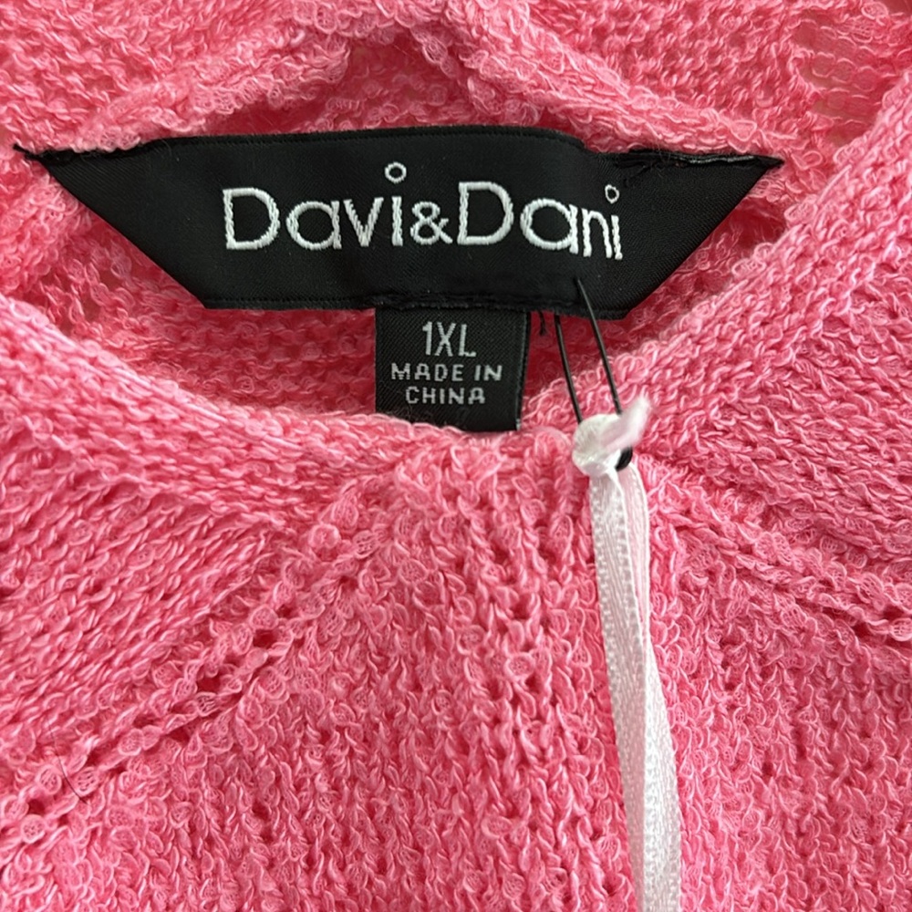 Beautiful pink sweater light weight .